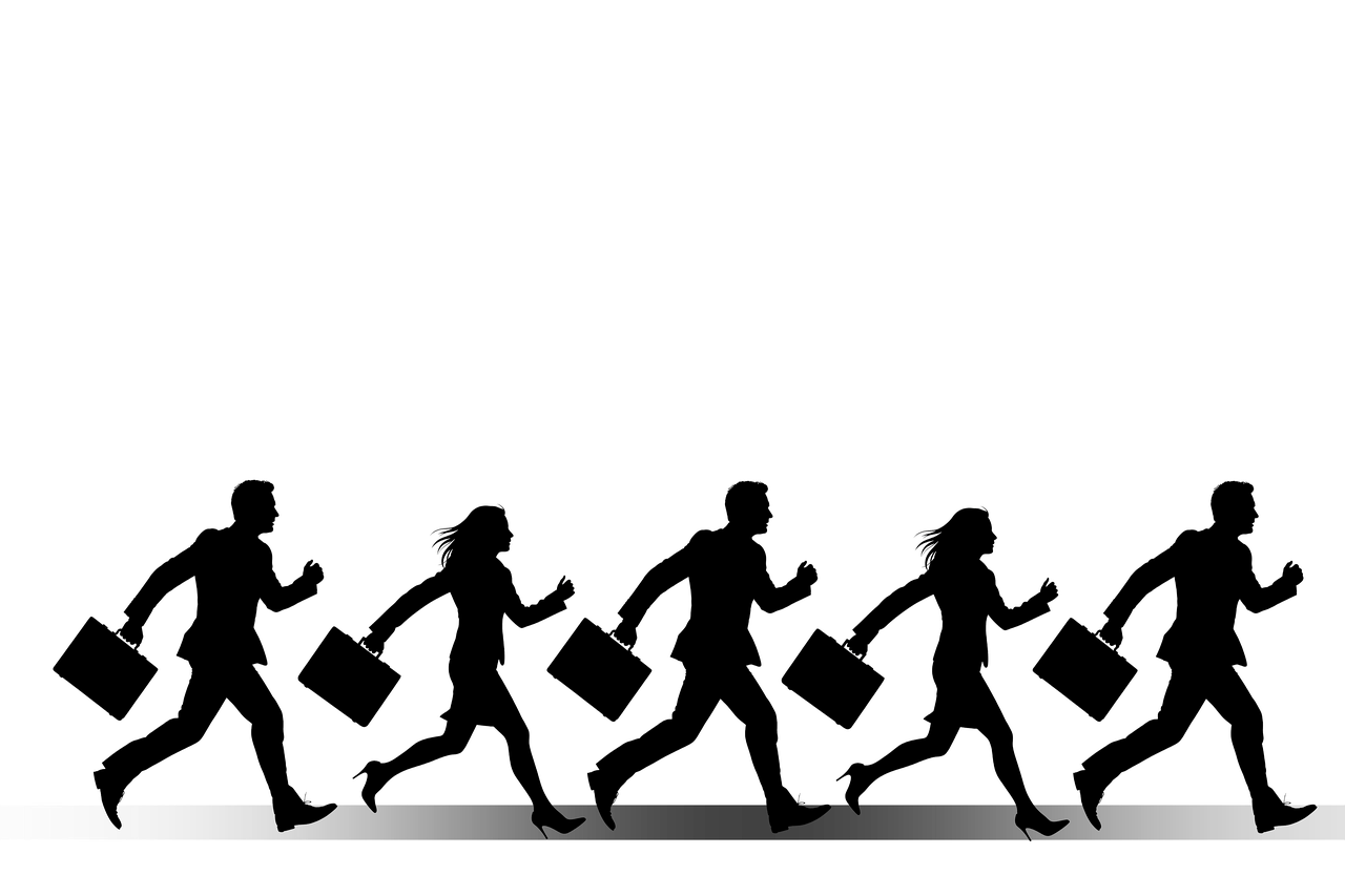 急ぐビジネスマン達のシルエット